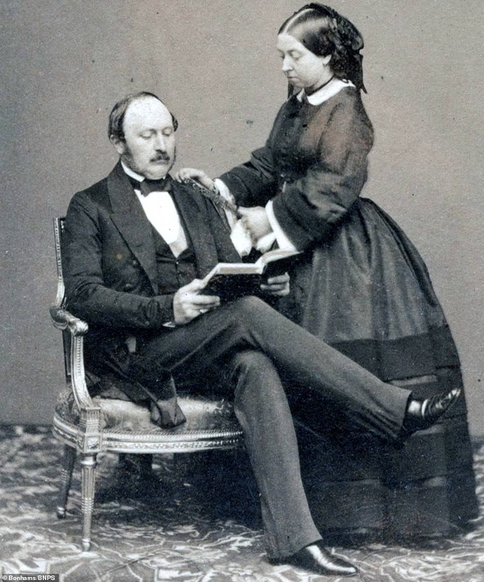 6420452 6409499 prince albert is pictured reading as queen victoria stands with a 37 1542714447657