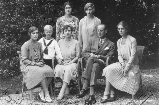 Prince philip of englands family poses for a photograph